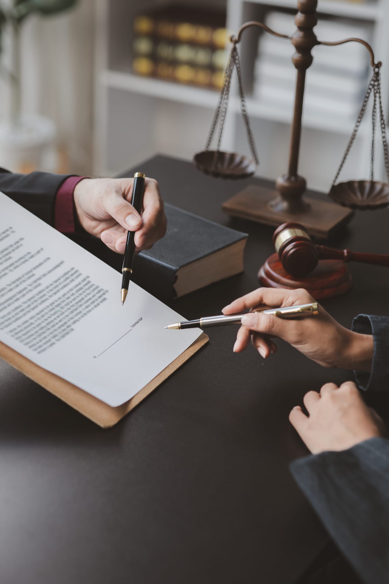 Адвокат Бисер Димов консултира клиенти в кантората си в Троян